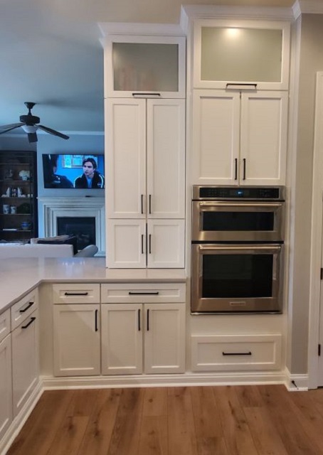 Fort Mill kitchen after — second angle showing custom carpentry