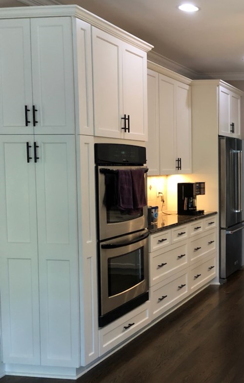Matthews kitchen after refacing — White Dove cabinets with Black Fox island