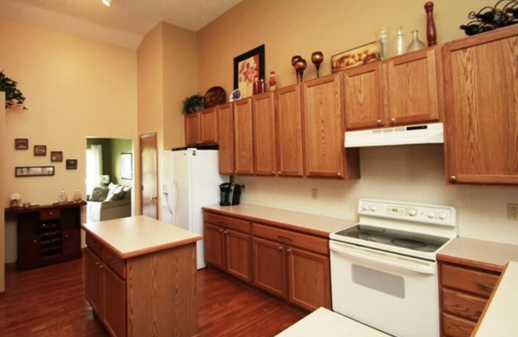Charlotte kitchen before refacing — original cabinets and island